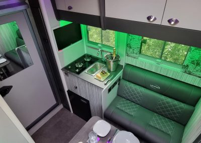 Aeos Discovery 45 - Full living area with green lighting